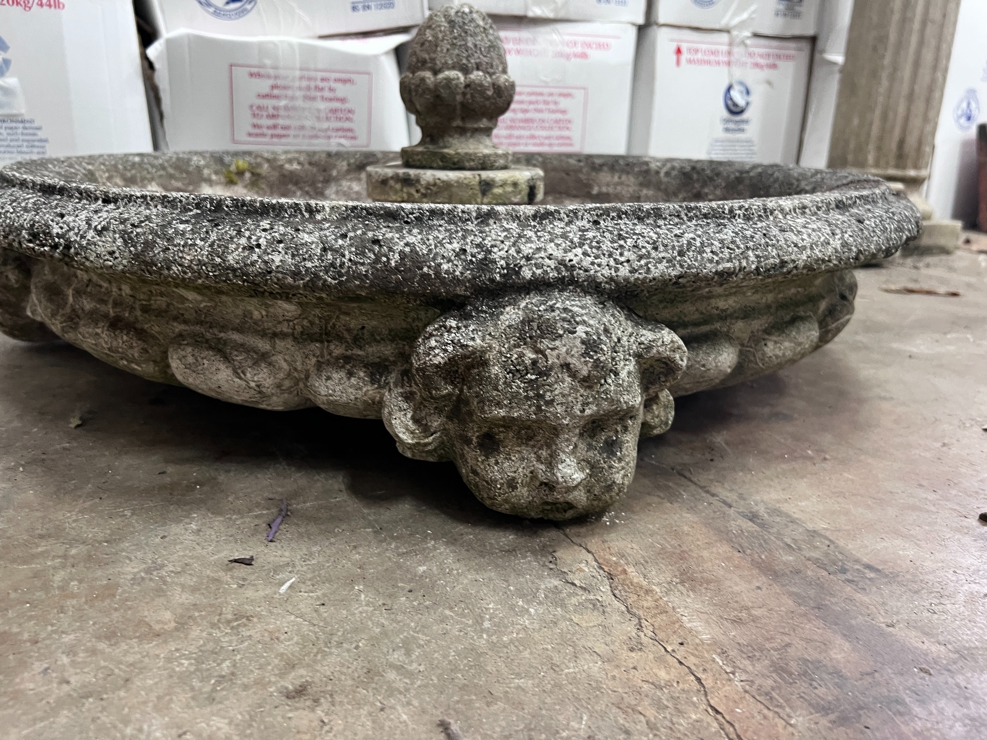 A reconstituted stone garden fountain with associated pedestal, width 76cm *Please note the sale commences at 9am.